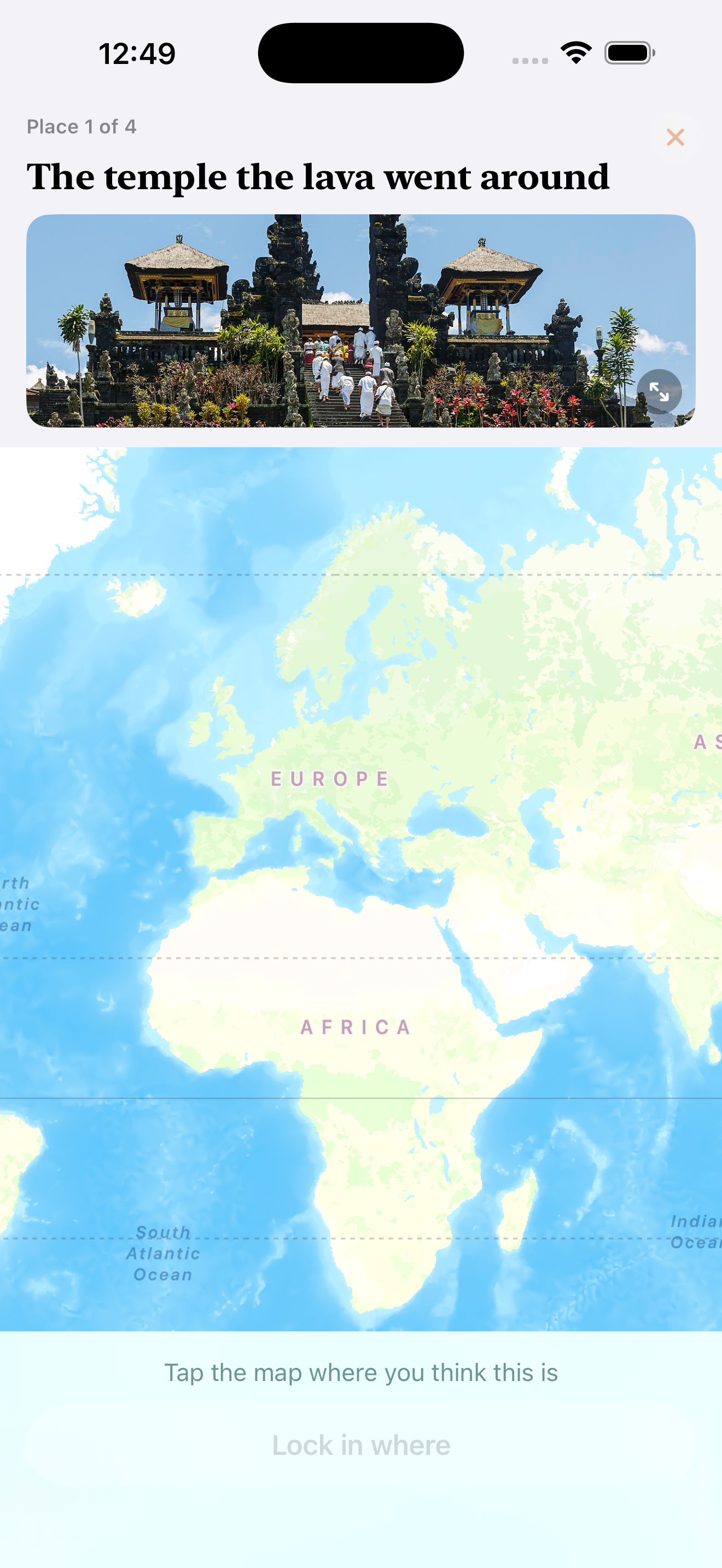 Guessing where a place is by tapping Everywhen's world map